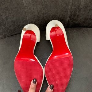White Christian Louboutin Iriza pumps 100